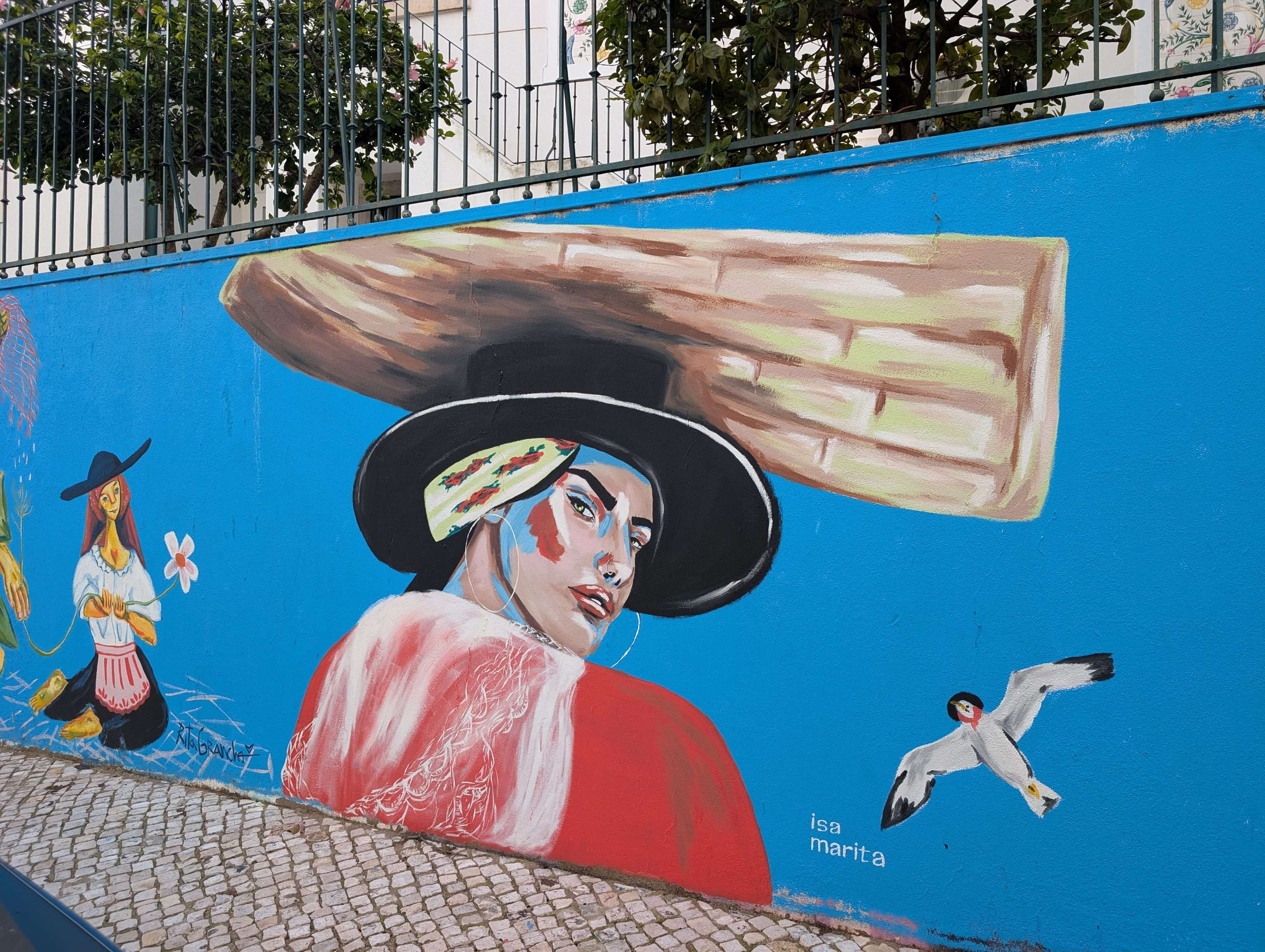 Wall of artworks about woman